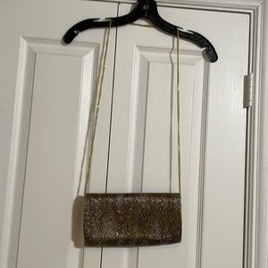 Gold evening clutch